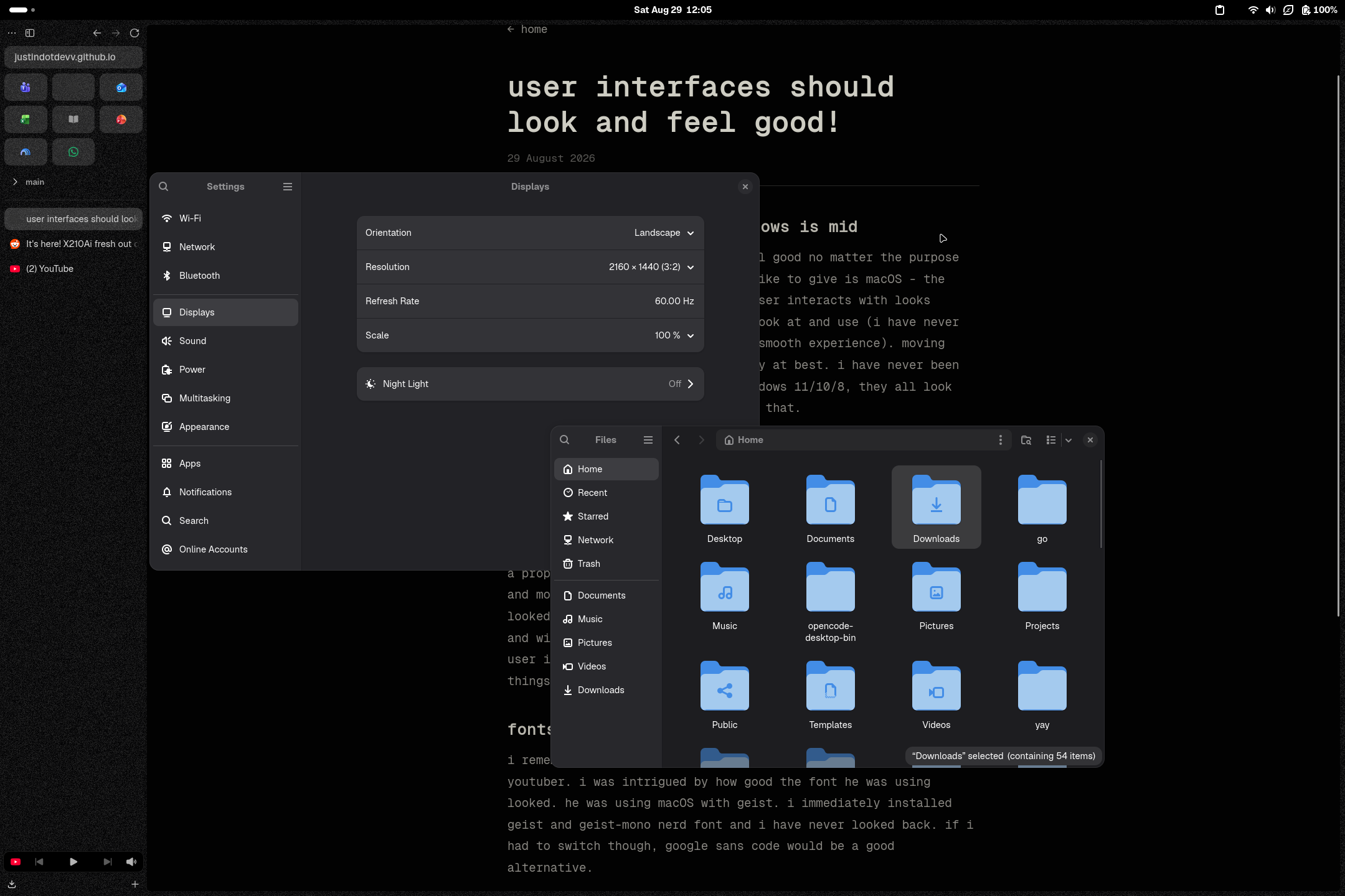 GNOME desktop with the Displays settings and Files windows open